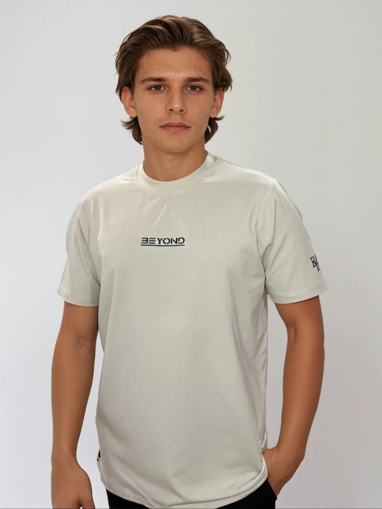 BEYOND Performance Tee in Slate Grey - Front view showing minimalist athletic design