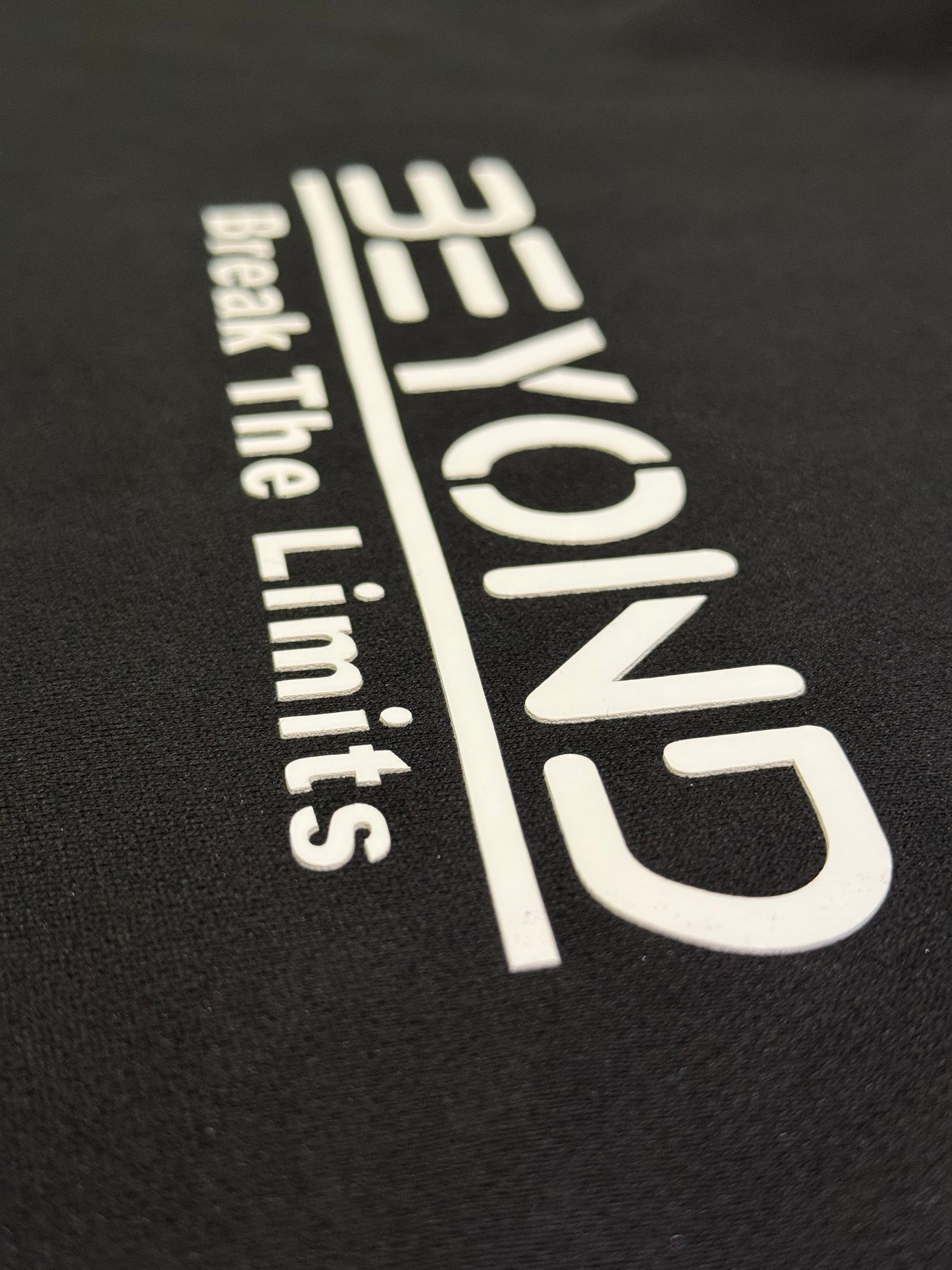 Beyond Elite Hoodie Stealth Black - Close-up of Beyond logo